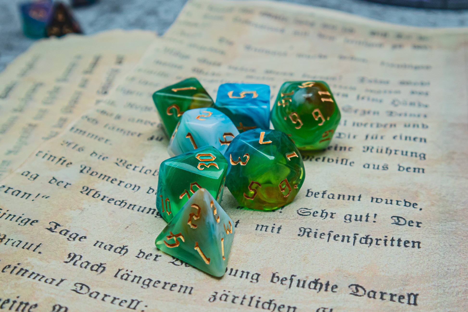 Northern Lights Polyhedral dice set - The Flaming Feather & Flaming Filament